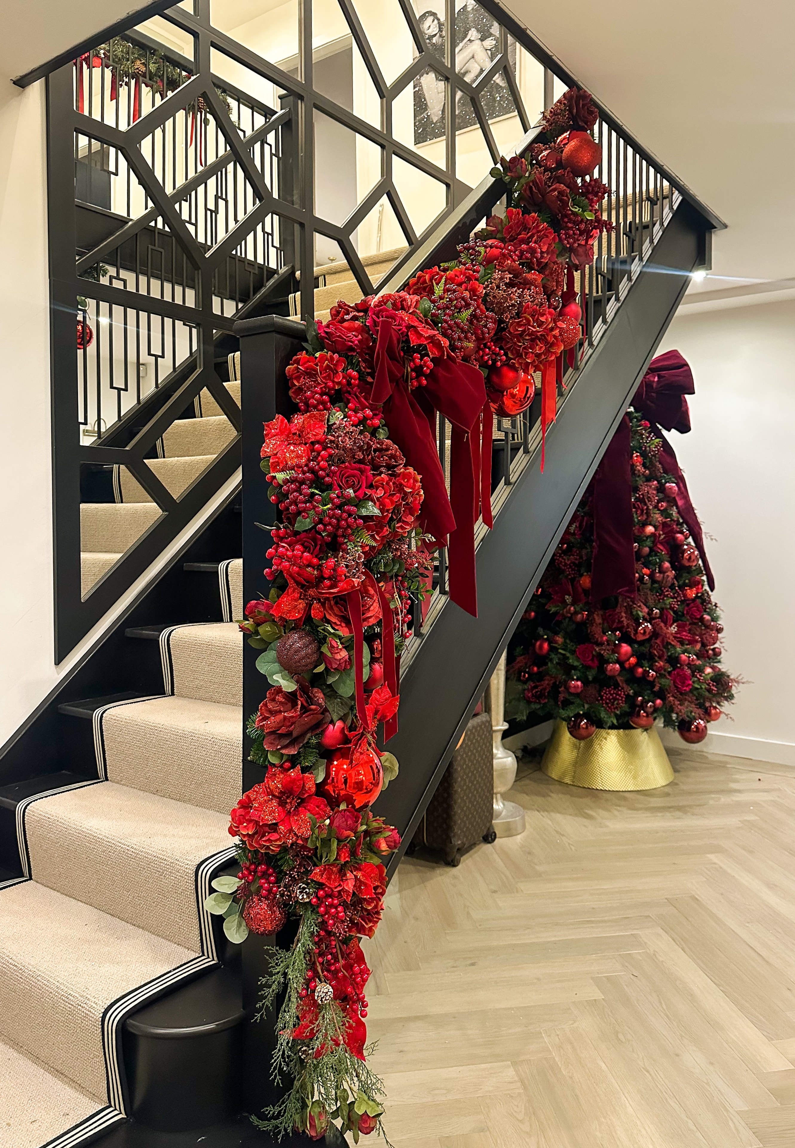 Luxury staircase garland installation