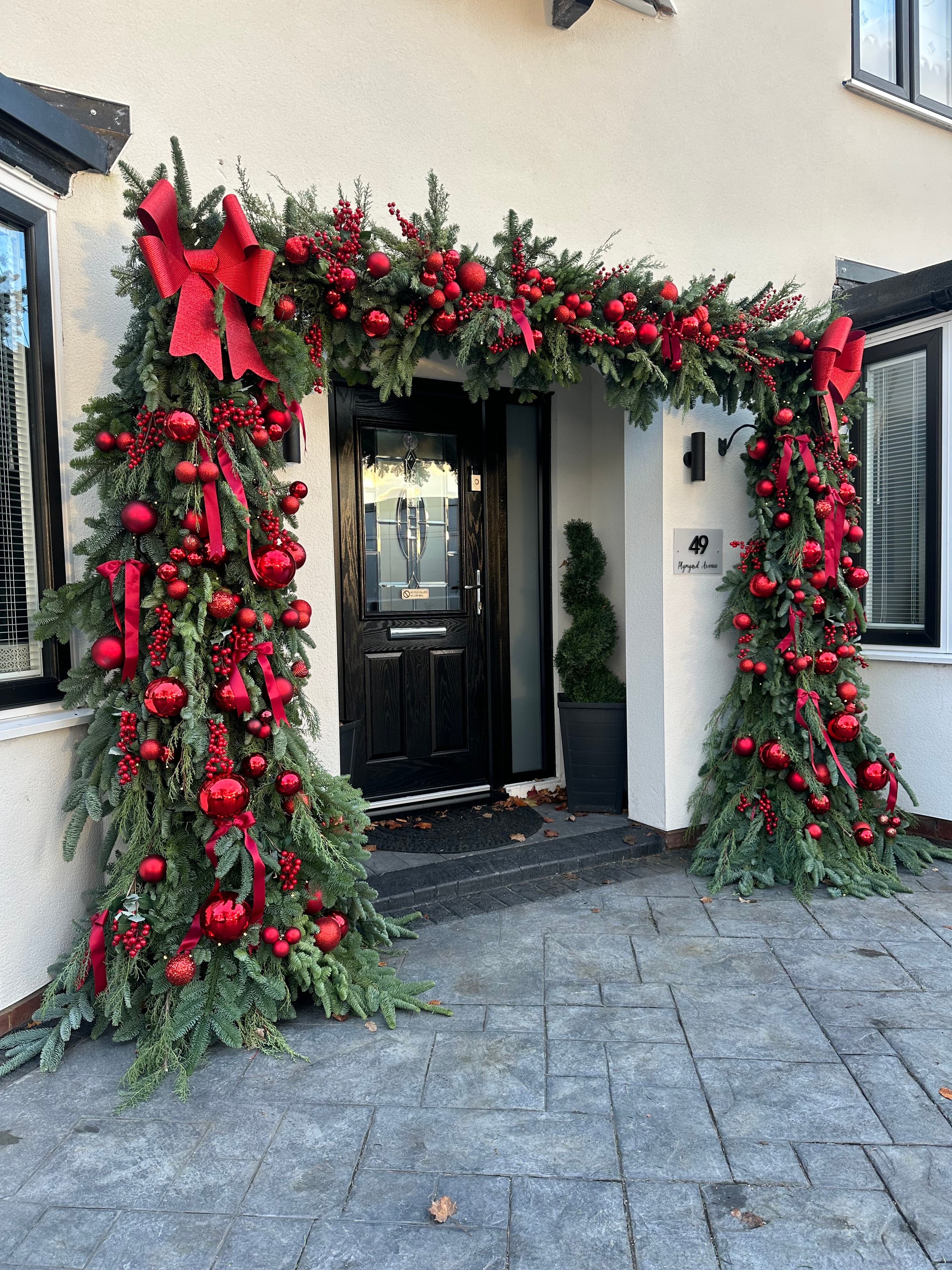 Exterior door garland arch