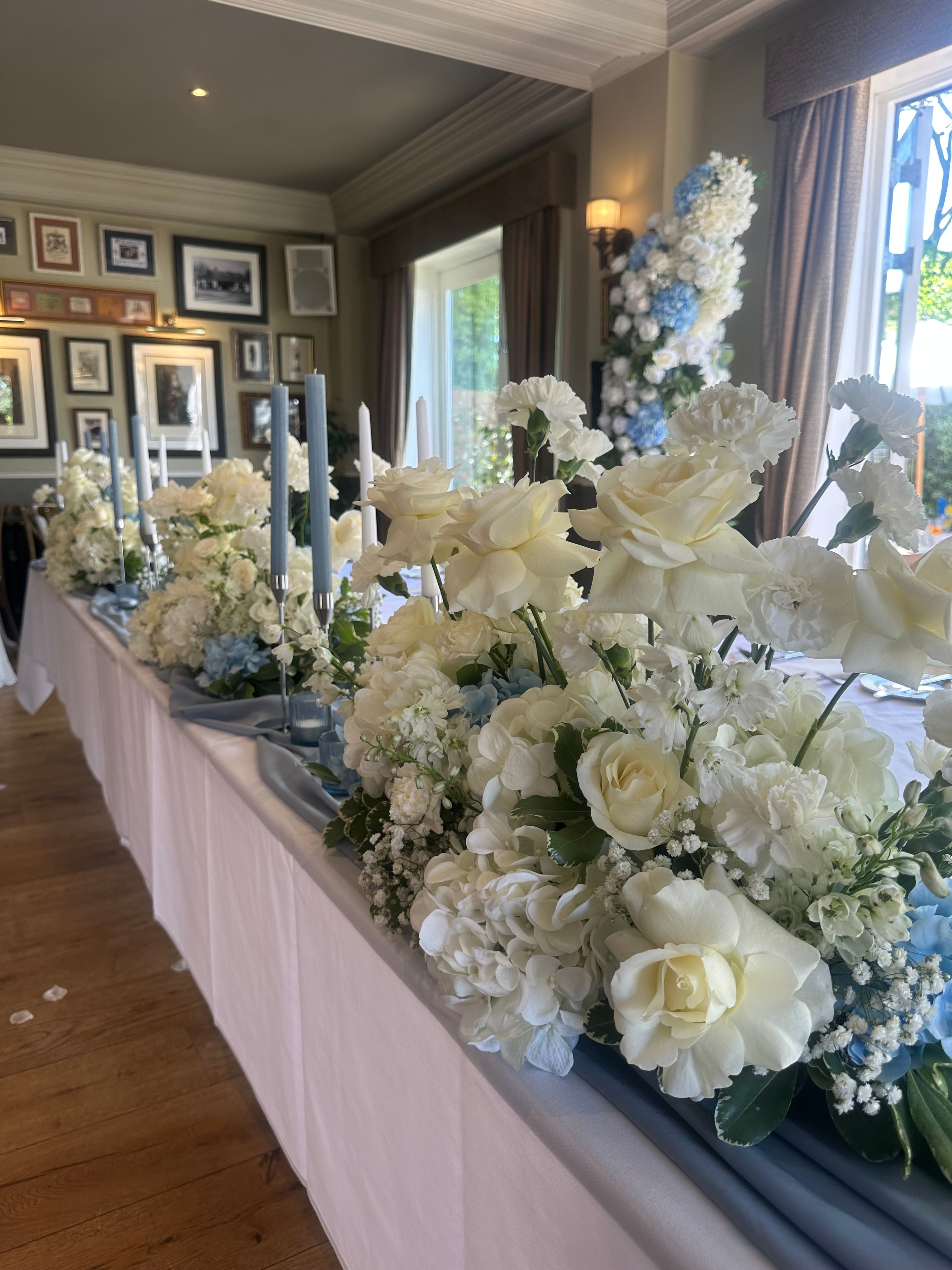 White and blue floral table centrepiece